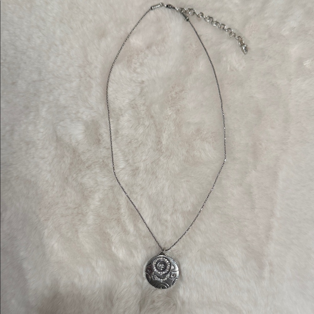 Silver Pendant Necklace with Floral Medallion